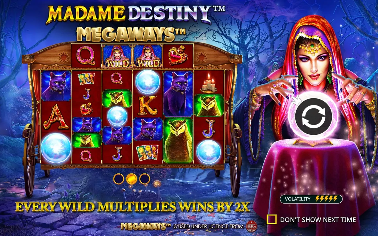 Startskärmen för Madame Destiny Megaways med vagnhjulen, wild-symboler och spådamen vid kristallkulan.